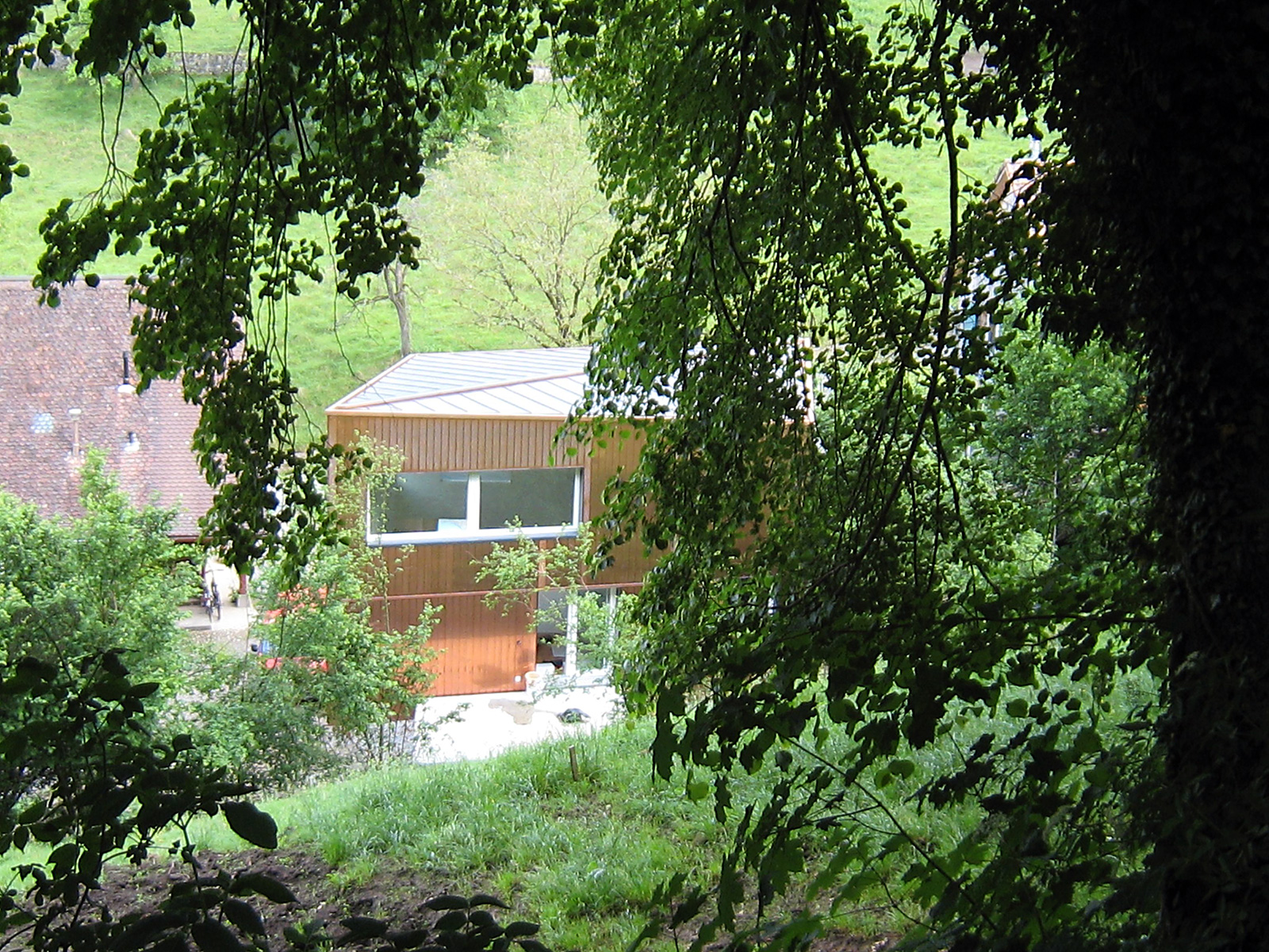 Jigsaw Piece, house amid greenery